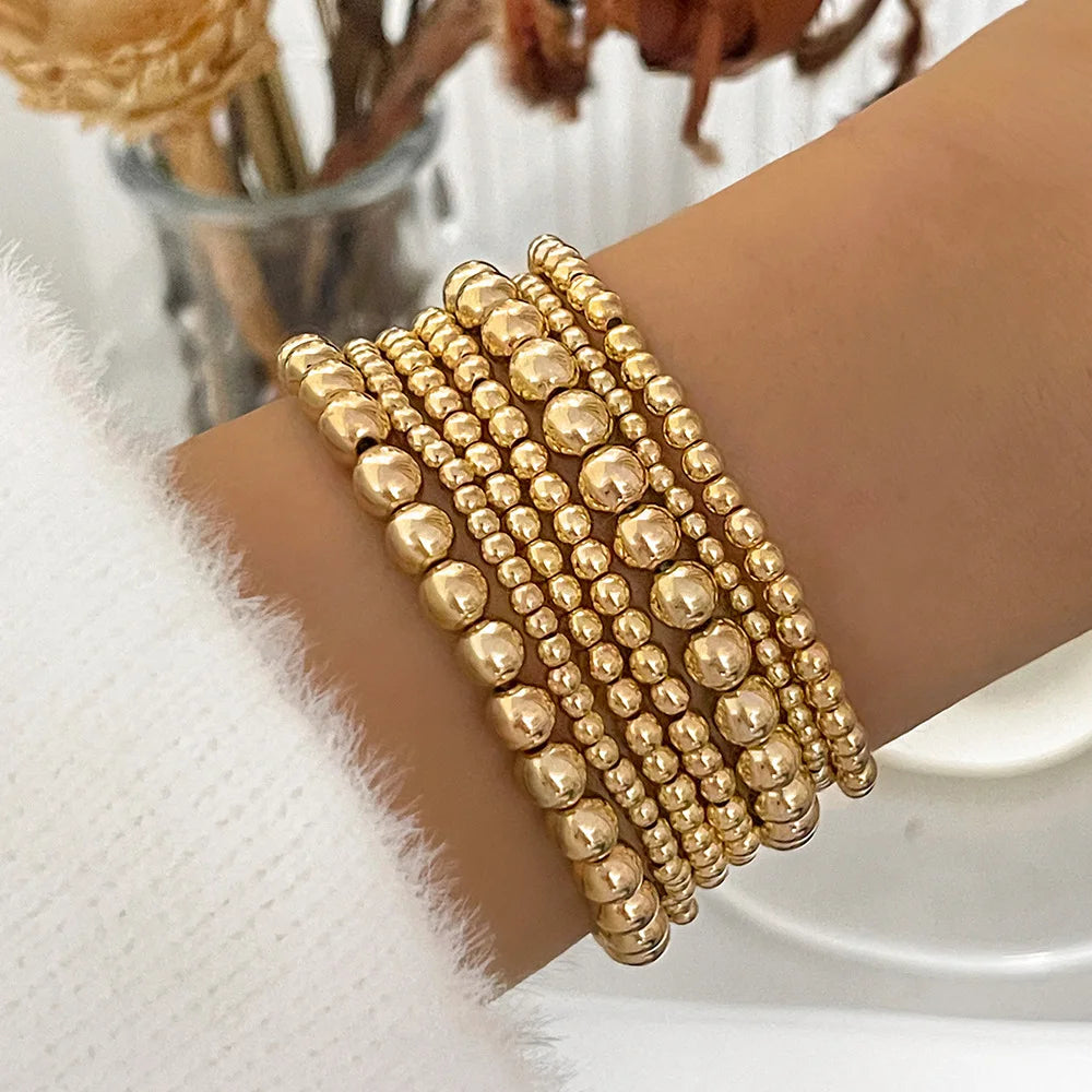 Gold Beaded Charm Bracelet – Handmade Elastic Chain Design