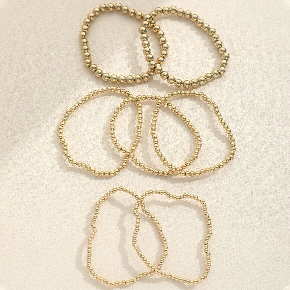 Gold Beaded Charm Bracelet – Handmade Elastic Chain Design