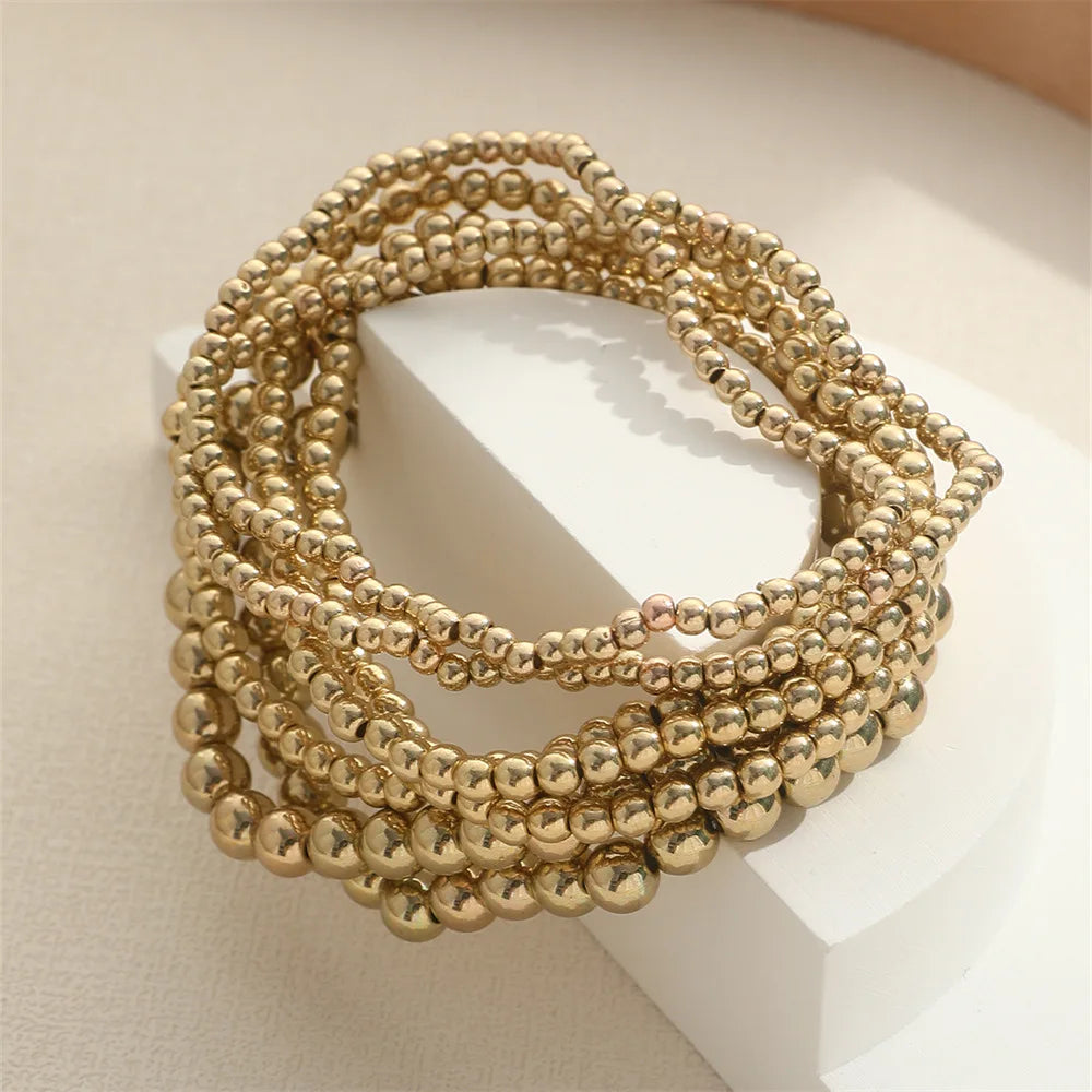 Gold Beaded Charm Bracelet – Handmade Elastic Chain Design